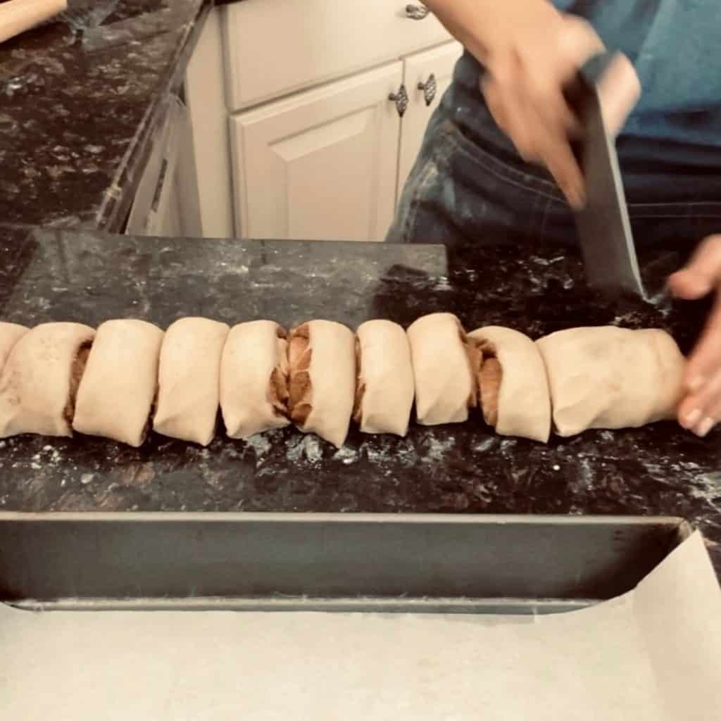 cinnamon roll log cut into 12 pieces