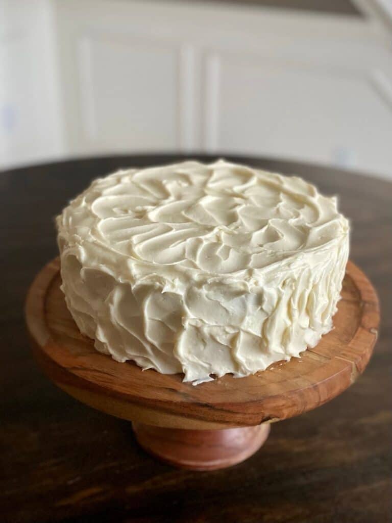 swirled frosting on carrot cake