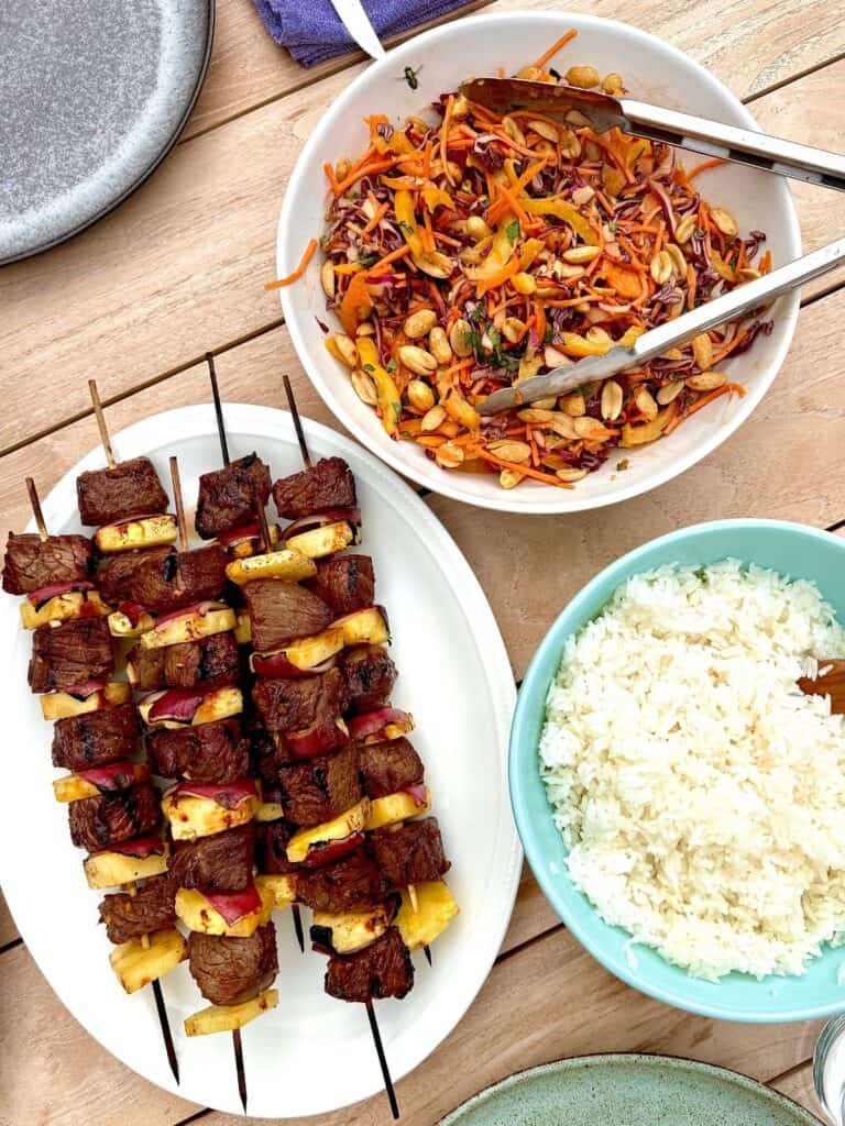short rib pineapple kabobs with peanut bell pepper slaw