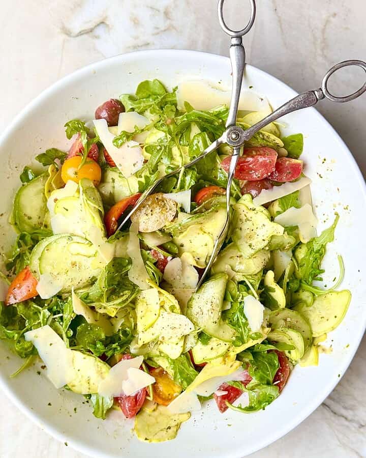 shaved baby squash and cherry tomato salad with pesto vinaigrette
