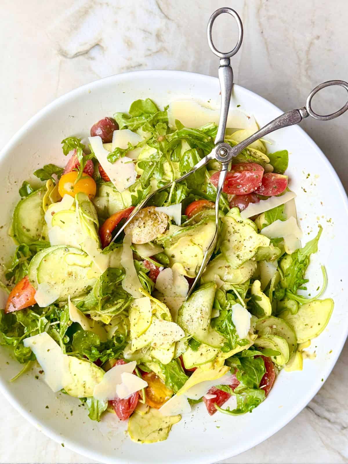 shaved baby squash and cherry tomato salad with pesto vinaigrette